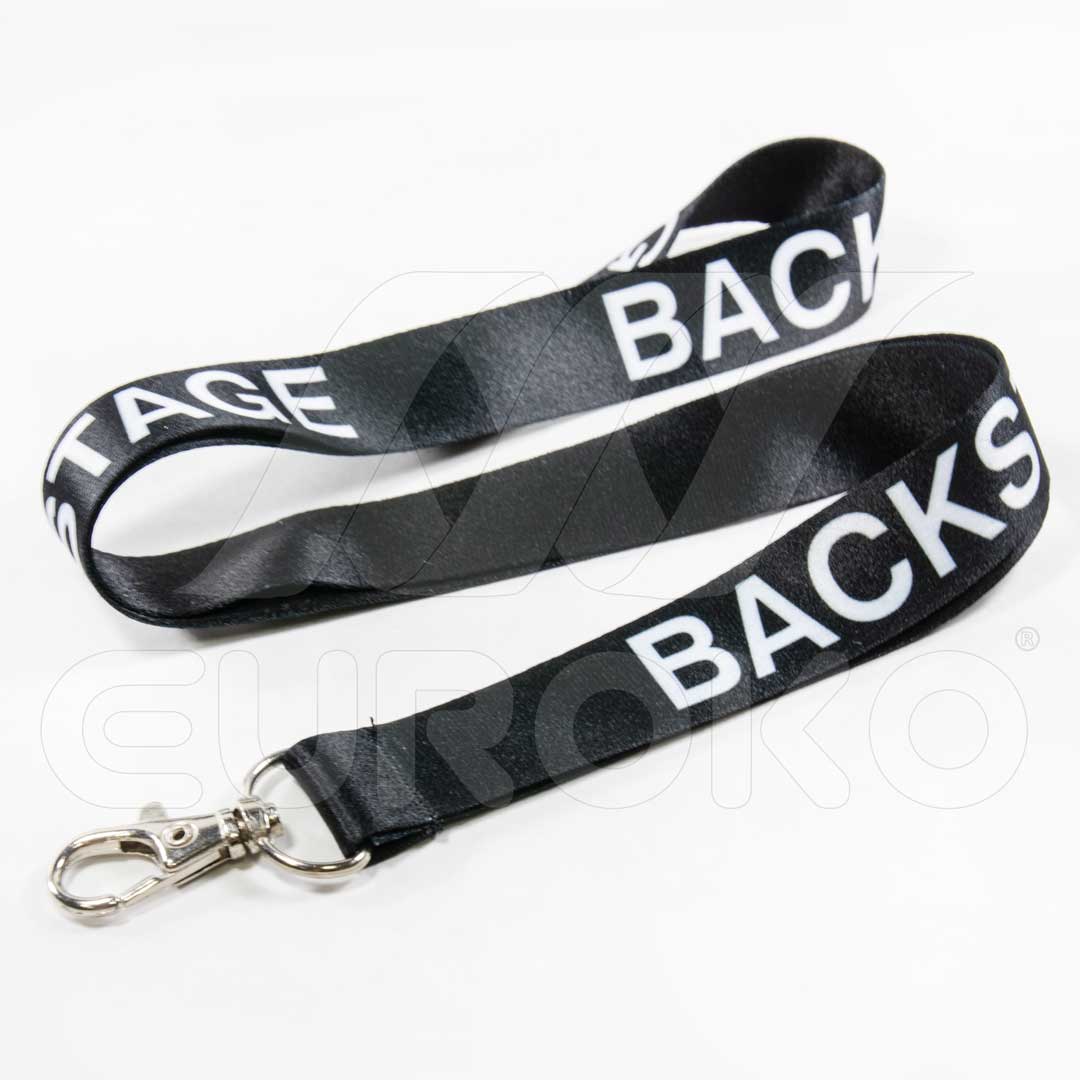 Design professionnel BACKSTAGE en blanc sur satin noir premium.